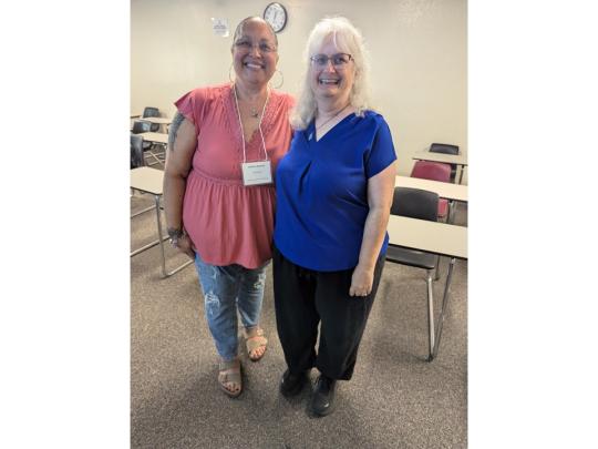 Sabrina Rawson and Michelle Jolly at conference